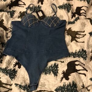 I’m selling a Brand New Fashion Nova Kehlani Rhinestone Denim Bodysuit🥰